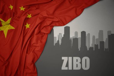 Kentin soyut silueti. Zibo 'nun gri arka planda renkli Çin bayrağı dalgalandırdığı bir yazı..