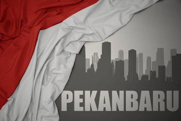 Silueta Abstracta Ciudad Con Texto Pekanbaru Cerca Ondeando Colorida Bandera —  Fotos de Stock