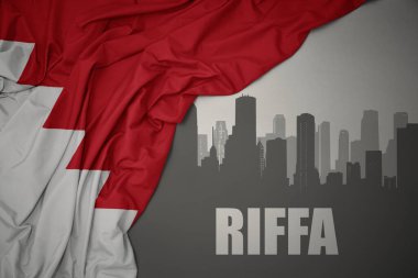 Kentin soyut silüeti, üzerinde Riffa yazıları olan, gri arka plan 3D bir resimde bahreyn 'in renkli ulusal bayrağını sallayan.