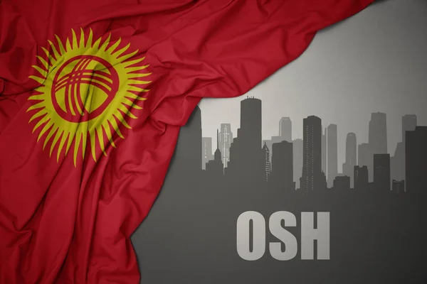 Kırgızistan Renkli Ulusal Bayrağının Dalgalanması Yakınındaki Yazı Ile Şehrin Soyut — Stok fotoğraf