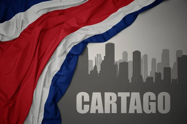 Abstrakcyjna Sylwetka Miasta Tekstem Cartago Pobliżu Machania Kolorowe Flagi Narodowej — Zdjęcie stockowe
