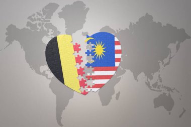 Dünya haritasında Belçika ve Malezya 'nın ulusal bayrağıyla bulmaca kalbi. 3B illüstrasyon