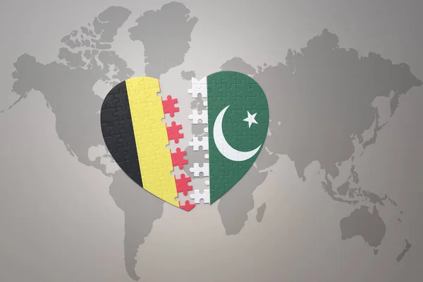 Puzzle Heart National Flag Belgium Pakistan World Map Background Concept — Stock Photo, Image