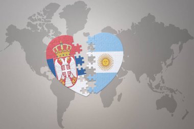 puzzle heart with the national flag of argentina and serbia on a world map background.Concept. 3D illustration