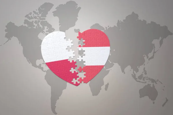 Puzzle Srdce Národní Vlajkou Rakouska Poland Pozadí Mapy Světa Koncepce — Stock fotografie