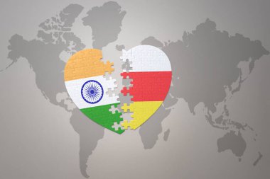 puzzle heart with the national flag of india and south ossetia on a world map background.Concept. 3D illustration