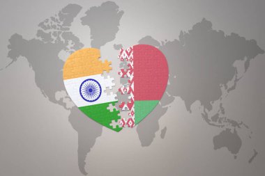 puzzle heart with the national flag of india and belarus on a world map background.Concept. 3D illustration