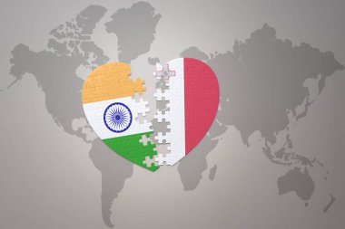 puzzle heart with the national flag of india and malta on a world map background.Concept. 3D illustration