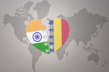 puzzle heart with the national flag of india and romania on a world map background.Concept. 3D illustration