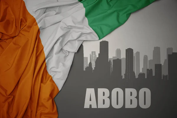 Abstract Silhouette City Text Abobo Waving Colorful National Flag Cote — Stockfoto