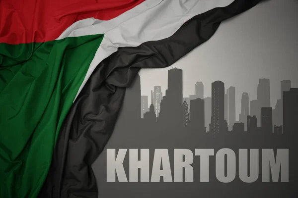 Abstract Silhouette City Text Khartoum Waving Colorful National Flag Sudan — Foto de Stock
