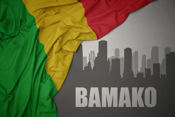 Silueta Abstracta Ciudad Con Texto Bamako Cerca Ondeando Colorida Bandera — Foto de Stock