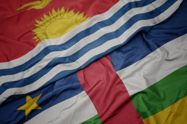waving colorful flag of central african republic and national flag of Kiribati . macro.3d illustration