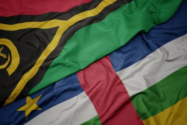 waving colorful flag of central african republic and national flag of Vanuatu . macro.3d illustration