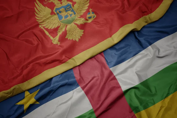 Размахивая Красочным Флагом Центральной Африканской Республики Национальным Флагом Черногории Macro — стоковое фото