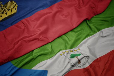 waving colorful flag of equatorial guinea and national flag of liechtenstein. macro.3d illustration