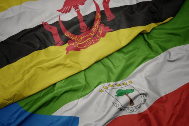 waving colorful flag of equatorial guinea and national flag of brunei. macro.3d illustration