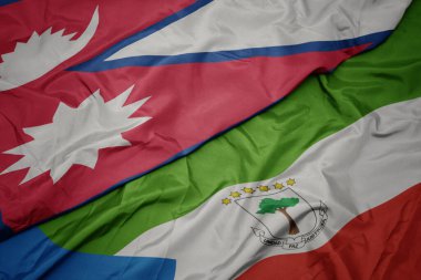 waving colorful flag of equatorial guinea and national flag of nepal. macro.3d illustration