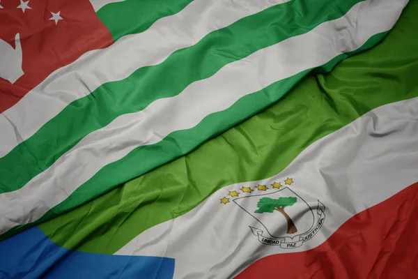 Размахивая Красочным Флагом Экваториальной Гвинеи Национальным Флагом Абхазии Macro Иллюстрация — стоковое фото