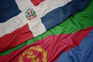 waving colorful flag of eritrea and national flag of dominican republic. macro.3d illustration