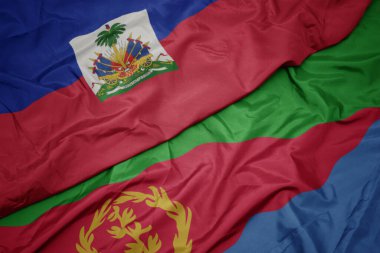 waving colorful flag of eritrea and national flag of haiti. macro.3d illustration