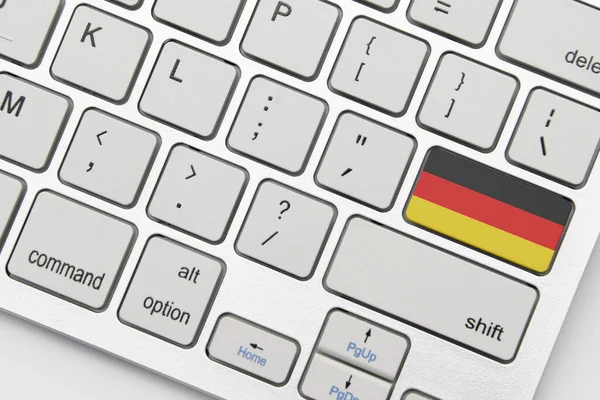 Nationalflagge Deutschlands Auf Der Tastatur Vor Grauem Hintergrund Konzept — Stockfoto