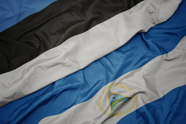 Zwaaiende Vlag Van Estonië Nationale Vlag Van Nicaragua Macro Illustratie — Stockfoto