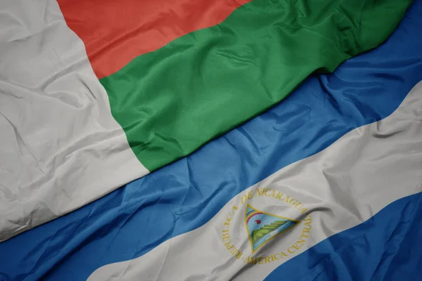 Acenando Bandeira Colorida Madagascar Bandeira Nacional Nicarágua Macro Ilustração — Fotografia de Stock