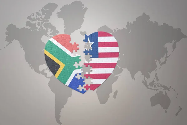 Puzzleherz Mit Der Nationalflagge Südafrikas Und Liberias Auf Einer Weltkarte — Stockfoto