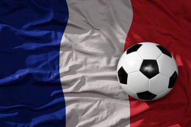 Fransa 'nın bayrağını sallayan eski, klasik futbol topu. 3B illüstrasyon