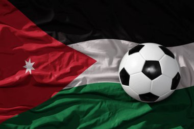 Jordan 'ın arka planında sallanan eski bir futbol topu. 3B illüstrasyon
