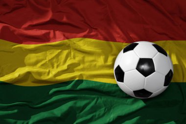 Bolivya arka planında sallanan eski bir futbol topu. 3B illüstrasyon
