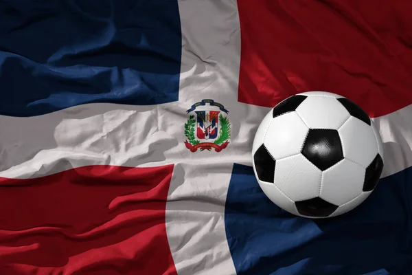 古老的足球 古老的足球在挥动国旗的多米尼加共和国背景 3D插图 — 图库照片