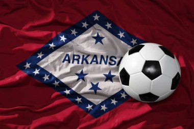 Arkansas eyaleti bayraklarında eski, klasik futbol topu. 3B illüstrasyon