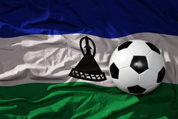 Alter Alter Fußballball Auf Der Wehenden Nationalflagge Lesotho Hintergrund Illustration — Stockfoto