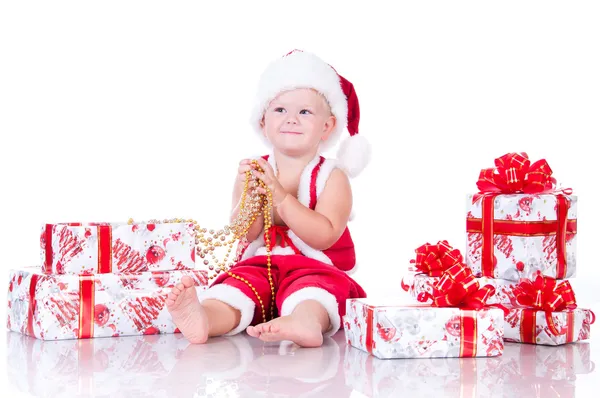 Little boy Santa Claus with Christmas gifts on a white backgroun — Stock Photo, Image