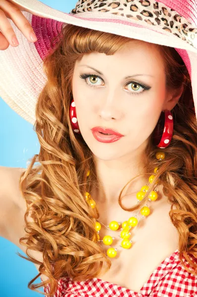 A large portrait of a cute red-haired girl in the pink sun hat — Stock Photo, Image