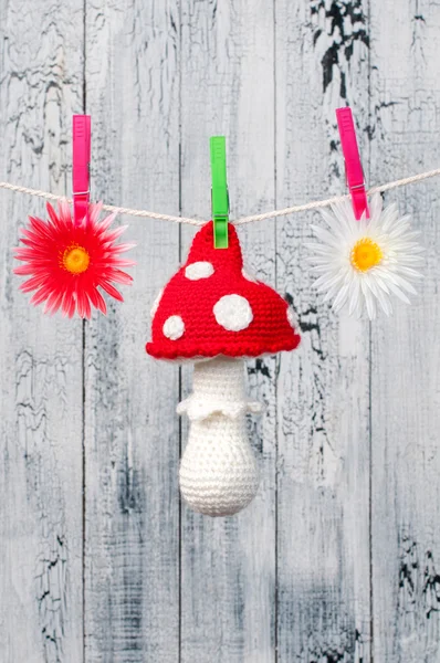 Children's toy hanging on the clothesline. — Stock Photo, Image