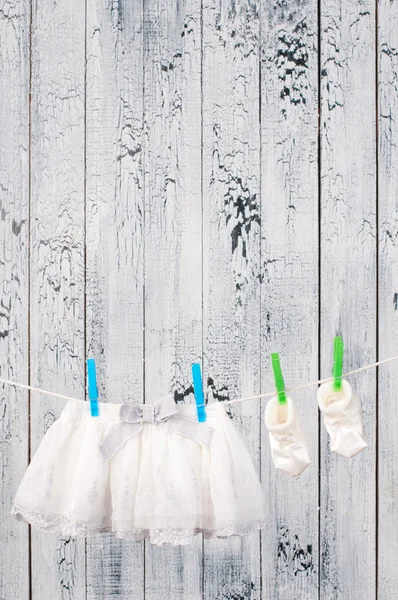 Baby clothes hanging on the clothesline. — Stock Photo, Image