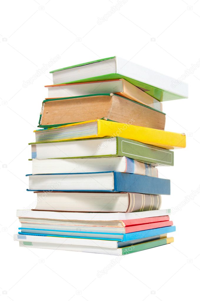 A stack of colorful books and magazines isolated on white background.