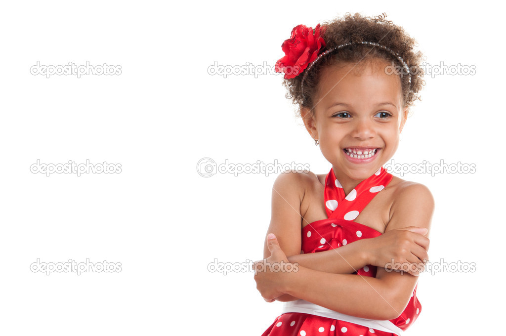 Portrait of a cheerful little girl mulatto.