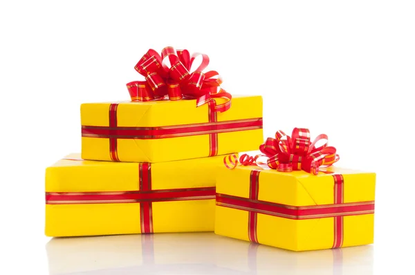 Three yellow gift on a white background. — Stock Photo, Image