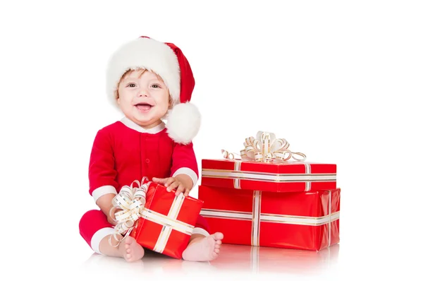 Cheerful little Santa Claus with presents. Isolated on white bac — Stock Photo, Image