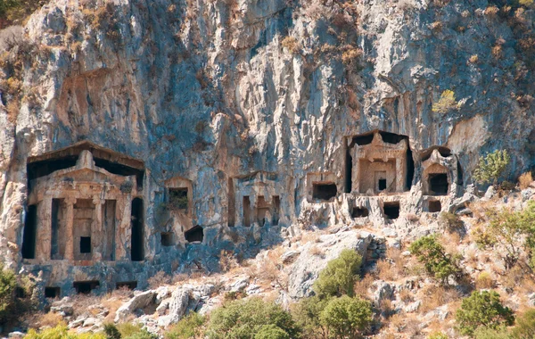 Turkish  Lycian tombs  - ancient necropolis in the mountains — Stock Photo, Image