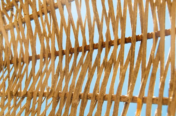 Фон ротанга зонтик плетеного — стоковое фото