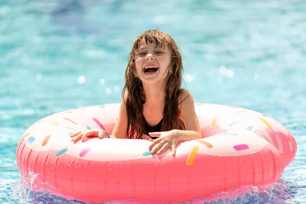 Smiling Little Girl Swims Sea Pool Pink Inflatable Donut Ring — Stock Photo, Image