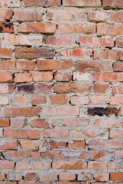 Red brick wall, close-up, brickwork background. Old building materials — Foto Stock