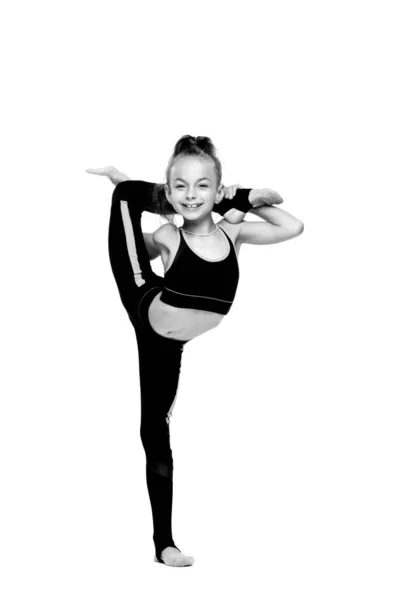 Ένα Νεαρό Ευέλικτο Κορίτσι Γυμναστής Μια Φόρμα Γυμναστικής Κάνει Ασκήσεις — Φωτογραφία Αρχείου