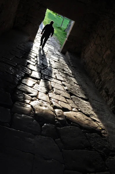Silhouette at the entrance to the monastery — Stock Photo, Image