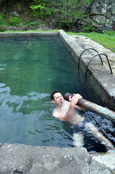 Man bathed in warm spring in Borjomi — Stock Photo, Image